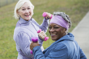 Senior women exercising in the park
